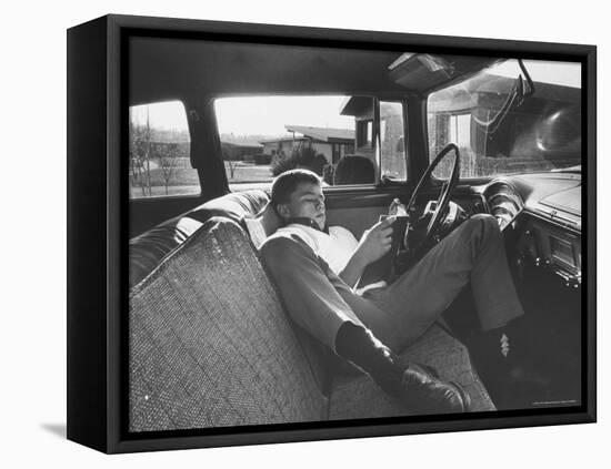 Teenager Robert Riesenmy Jr. Reading in Car at Home-Robert W^ Kelley-Framed Stretched Canvas
