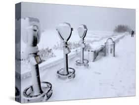 Telescope Viewers are Covered in Snow Overlooking Lighthouse Beach in Chatham, Massachusetts-null-Stretched Canvas