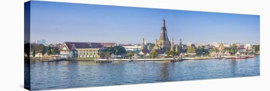 Temple of Dawn (Wat Arun) and Bangkok, Thailand-Jon Arnold-Stretched Canvas