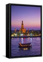 Temple of Dawn (Wat Arun) and Bangkok, Thailand-Jon Arnold-Framed Stretched Canvas