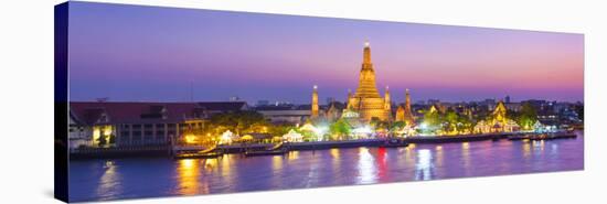 Temple of Dawn (Wat Arun) and Bangkok, Thailand-Jon Arnold-Stretched Canvas