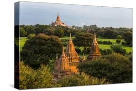 Temples in the Jungle at Sunrise, Bagan, Mandalay Region, Myanmar-Keren Su-Stretched Canvas