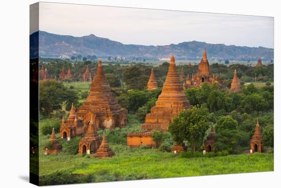Temples in the Jungle at Sunrise, Bagan, Mandalay Region, Myanmar-Keren Su-Stretched Canvas