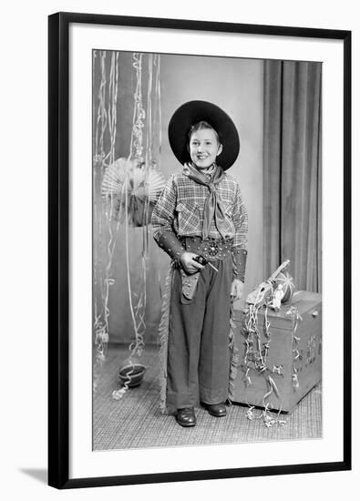 Ten-Year-Old Boy Poses in a Cowboy Outfit, Ca. 1951-null-Framed Photographic Print