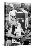 Ten Year Old Boy Rides on a Parade Float Promoting Milk in Wisconsin, Ca. 1956-null-Stretched Canvas