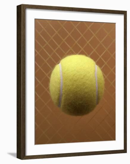 Tennis Ball Against a Racquet-null-Framed Photographic Print