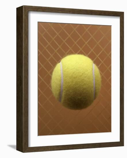 Tennis Ball Against a Racquet-null-Framed Photographic Print