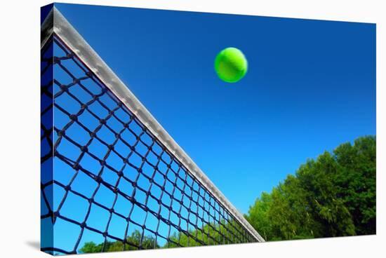 Tennis Ball on Net's Edge-mikdam-Stretched Canvas