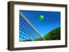 Tennis Ball on Net's Edge-mikdam-Framed Photographic Print