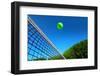 Tennis Ball on Net's Edge-mikdam-Framed Photographic Print