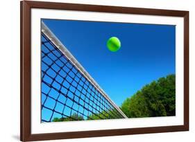 Tennis Ball on Net's Edge-mikdam-Framed Photographic Print