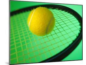 Tennis Ball on Racquet-null-Mounted Photographic Print