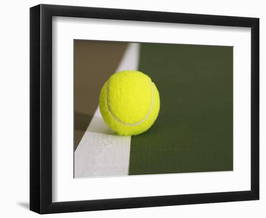 Tennis ball on white boundary stripe-Monalyn Gracia-Framed Photographic Print