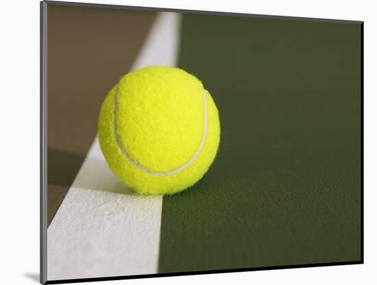 Tennis ball on white boundary stripe-Monalyn Gracia-Mounted Photographic Print