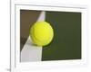 Tennis ball on white boundary stripe-Monalyn Gracia-Framed Photographic Print