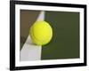 Tennis ball on white boundary stripe-Monalyn Gracia-Framed Photographic Print