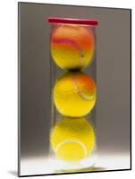 Tennis Balls in a Container-null-Mounted Photographic Print