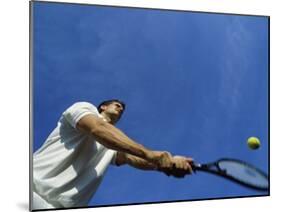Tennis Player with Blue Sky-null-Mounted Photographic Print