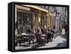 Terrace Tables Outside the Many Cafes and Restaurants on Rue De Lille in Old Quarter of Boulogne-Hazel Stuart-Framed Stretched Canvas