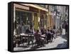 Terrace Tables Outside the Many Cafes and Restaurants on Rue De Lille in Old Quarter of Boulogne-Hazel Stuart-Framed Stretched Canvas