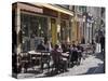 Terrace Tables Outside the Many Cafes and Restaurants on Rue De Lille in Old Quarter of Boulogne-Hazel Stuart-Stretched Canvas