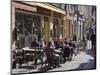 Terrace Tables Outside the Many Cafes and Restaurants on Rue De Lille in Old Quarter of Boulogne-Hazel Stuart-Mounted Photographic Print