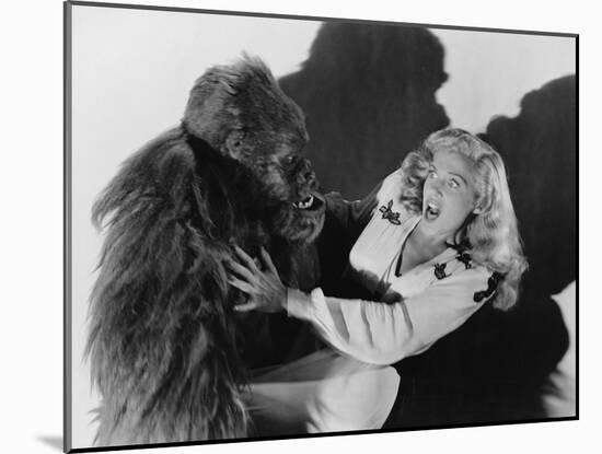 Terrified Woman Being Attacked by Gorilla-null-Mounted Photo