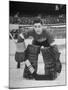 Terry Sawchuck, Star Goalie for the Detroit Red Wings, Posing in Front of Goal at Ice Arena-Alfred Eisenstaedt-Mounted Premium Photographic Print