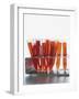 Test tubes filled with orange liquid-Kristopher Grunert-Framed Photographic Print