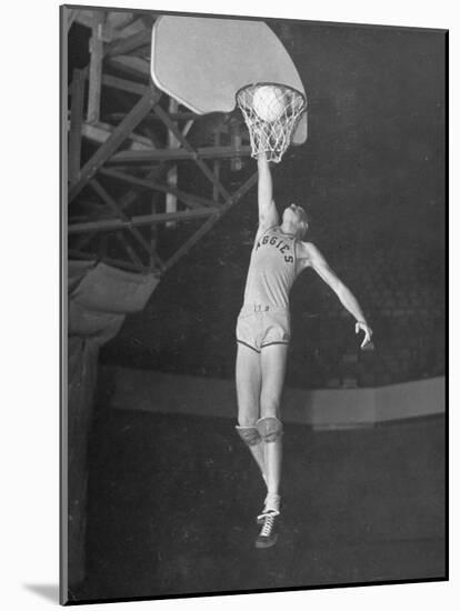 Texas A&M Basketball Player Bob Kurland Reaching to Make a Basket-Myron Davis-Mounted Premium Photographic Print