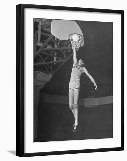 Texas A&M Basketball Player Bob Kurland Reaching to Make a Basket-Myron Davis-Framed Photographic Print