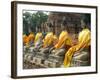 Thailand, Ayutthaya, Wat Yai Chaiyamongkhan. Row of Buddha Statues-Kevin Oke-Framed Photographic Print