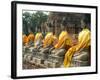 Thailand, Ayutthaya, Wat Yai Chaiyamongkhan. Row of Buddha Statues-Kevin Oke-Framed Photographic Print