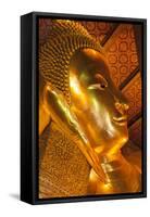 Thailand, Bangkok. Close-up of the head of the Reclining Buddha inside Wat Pho.-Brenda Tharp-Framed Stretched Canvas