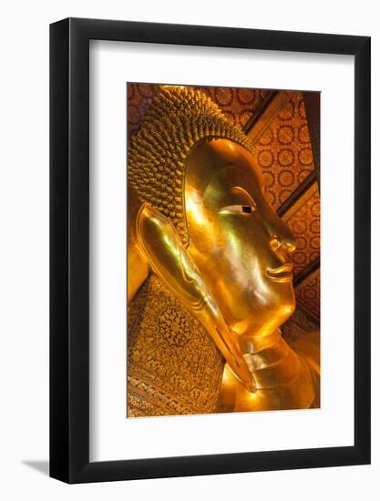 Thailand, Bangkok. Close-up of the head of the Reclining Buddha inside Wat Pho.-Brenda Tharp-Framed Photographic Print