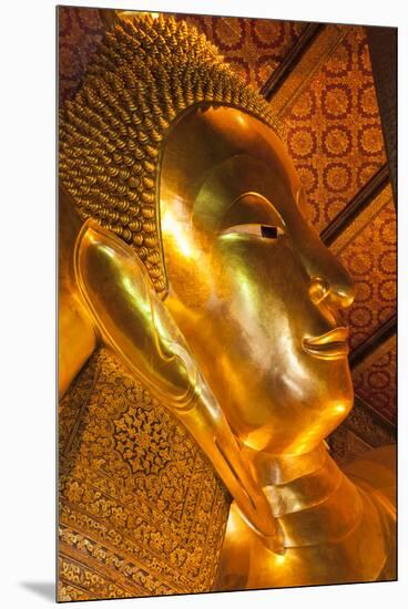 Thailand, Bangkok. Close-up of the head of the Reclining Buddha inside Wat Pho.-Brenda Tharp-Mounted Premium Photographic Print