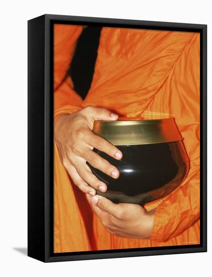 Thailand, Bangkok, Detail of Monk Holding Alms Bowl-Steve Vidler-Framed Stretched Canvas