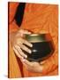 Thailand, Bangkok, Detail of Monk Holding Alms Bowl-Steve Vidler-Stretched Canvas