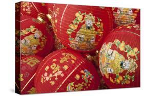 Thailand, Bangkok, Paper lanterns in a pile before being hung for festival.-Merrill Images-Stretched Canvas