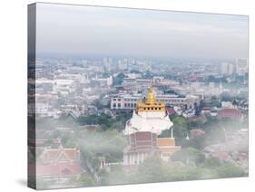 Thailand, Bangkok, the Golden Mount (Phu Khao Thong) at Wat Saket Shrouded in Fog-Shaun Egan-Stretched Canvas