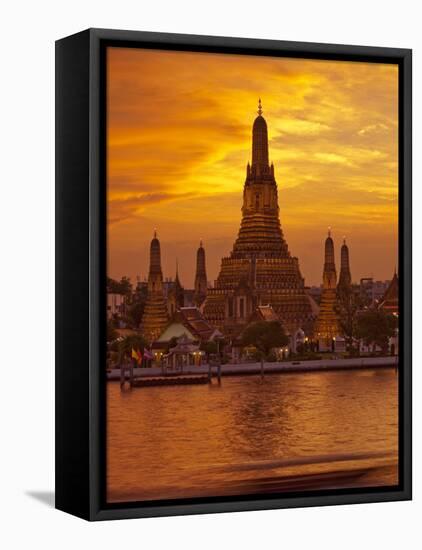 Thailand, Bangkok, Wat Arun ,Temple of the Dawn and Chao Phraya River Illuminated at Sunset-Gavin Hellier-Framed Stretched Canvas