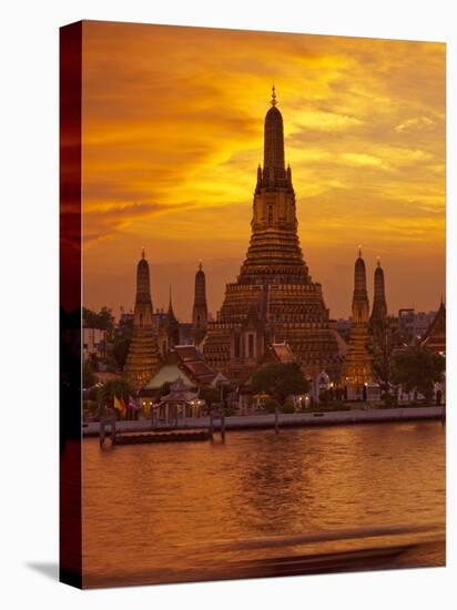Thailand, Bangkok, Wat Arun ,Temple of the Dawn and Chao Phraya River Illuminated at Sunset-Gavin Hellier-Stretched Canvas