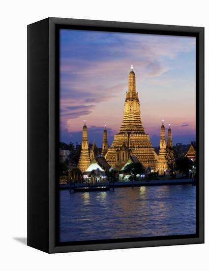 Thailand, Bangkok, Wat Arun ,Temple of the Dawn and Chao Phraya River Illuminated at Sunset-Gavin Hellier-Framed Stretched Canvas