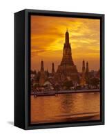Thailand, Bangkok, Wat Arun ,Temple of the Dawn and Chao Phraya River Illuminated at Sunset-Gavin Hellier-Framed Stretched Canvas