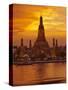 Thailand, Bangkok, Wat Arun ,Temple of the Dawn and Chao Phraya River Illuminated at Sunset-Gavin Hellier-Stretched Canvas