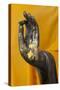 Thailand. Buddha Statue hand with gold leaf tokens.-Brenda Tharp-Stretched Canvas