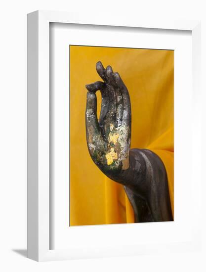 Thailand. Buddha Statue hand with gold leaf tokens.-Brenda Tharp-Framed Photographic Print