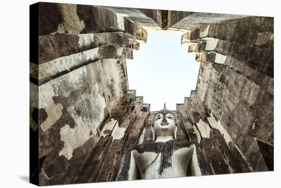 Thailand, Sukhothai Historical Park. Wat Si Chum Temple with Giant Buddha Statue, Low Angle View-Matteo Colombo-Stretched Canvas