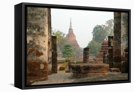 Thailand, Sukhothai. Wat Mahathat Chedi at Sukhothai Historic Park-Kevin Oke-Framed Stretched Canvas