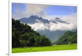 Thatched cottages and rice paddy fields with misty mountains behind, Mai Chau, Vietnam, Indochina,-Alex Robinson-Framed Photographic Print